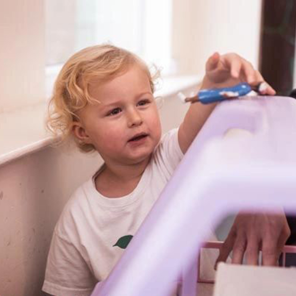 child playing with toy